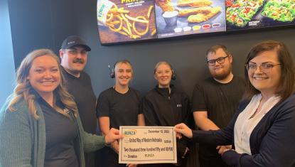 Runza check presentation to United Way